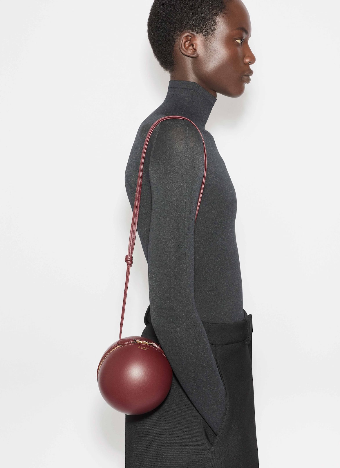 SPHERE BAG IN LAMBSKIN ALAÏA GARNET RED SPHERE BAG IN LAMBSKIN